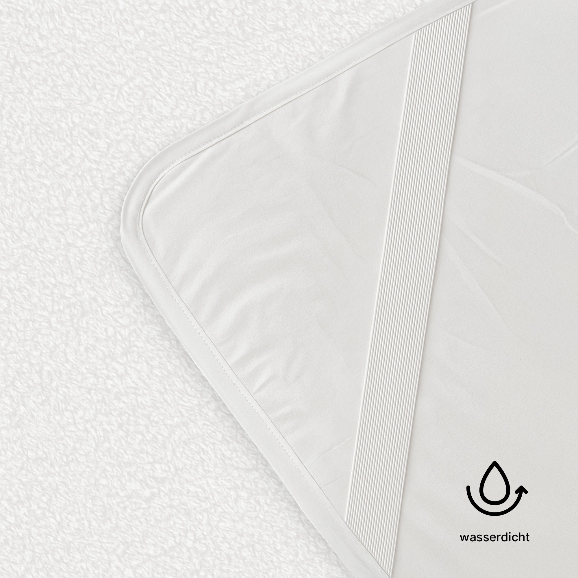 Matratzenschoner mit elastischen Eckbändern